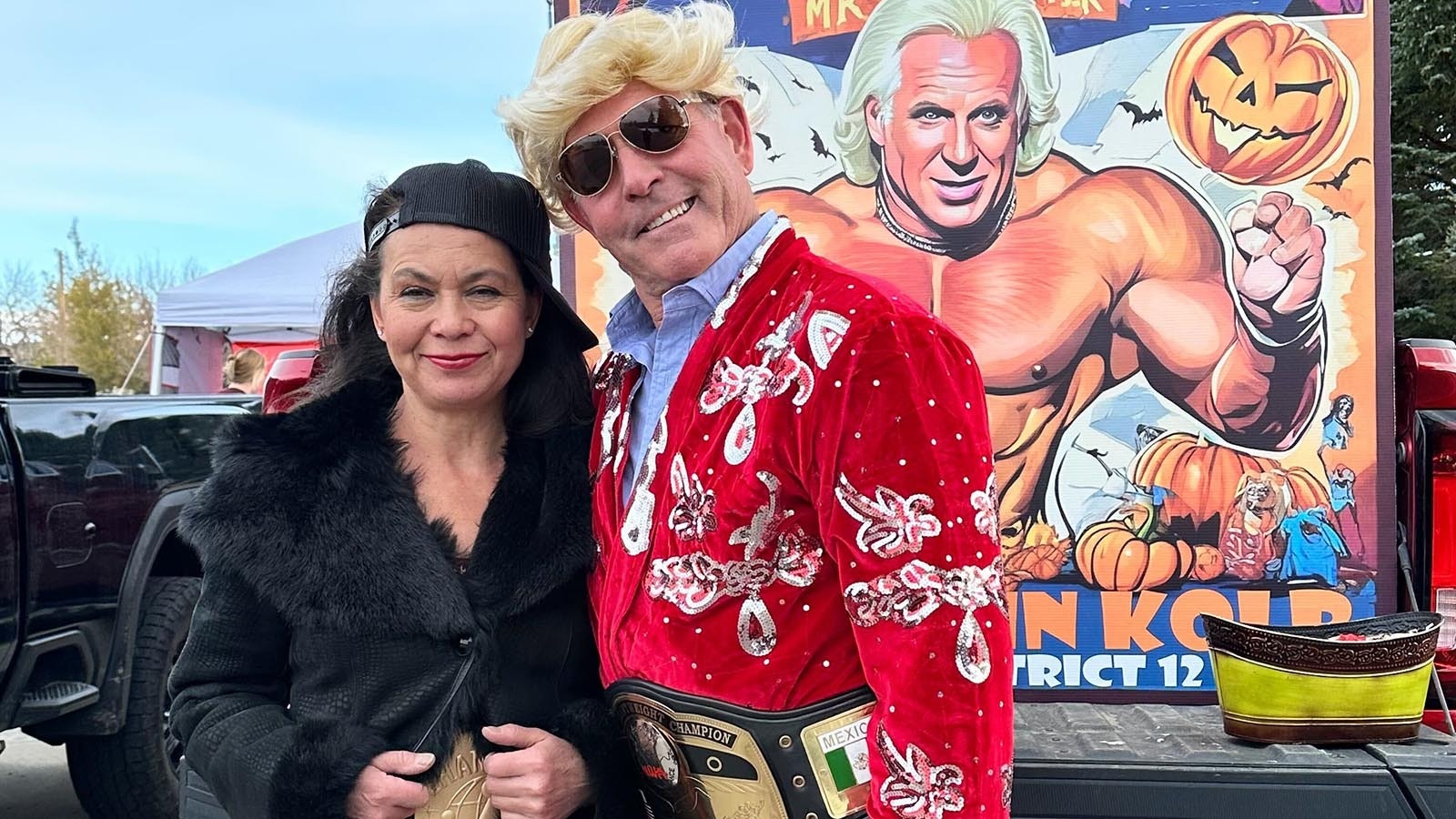 State Sen. John Kolb, R-Rock Springs, right, dressed as "Nature Boy" Ric Flair for Halloween.