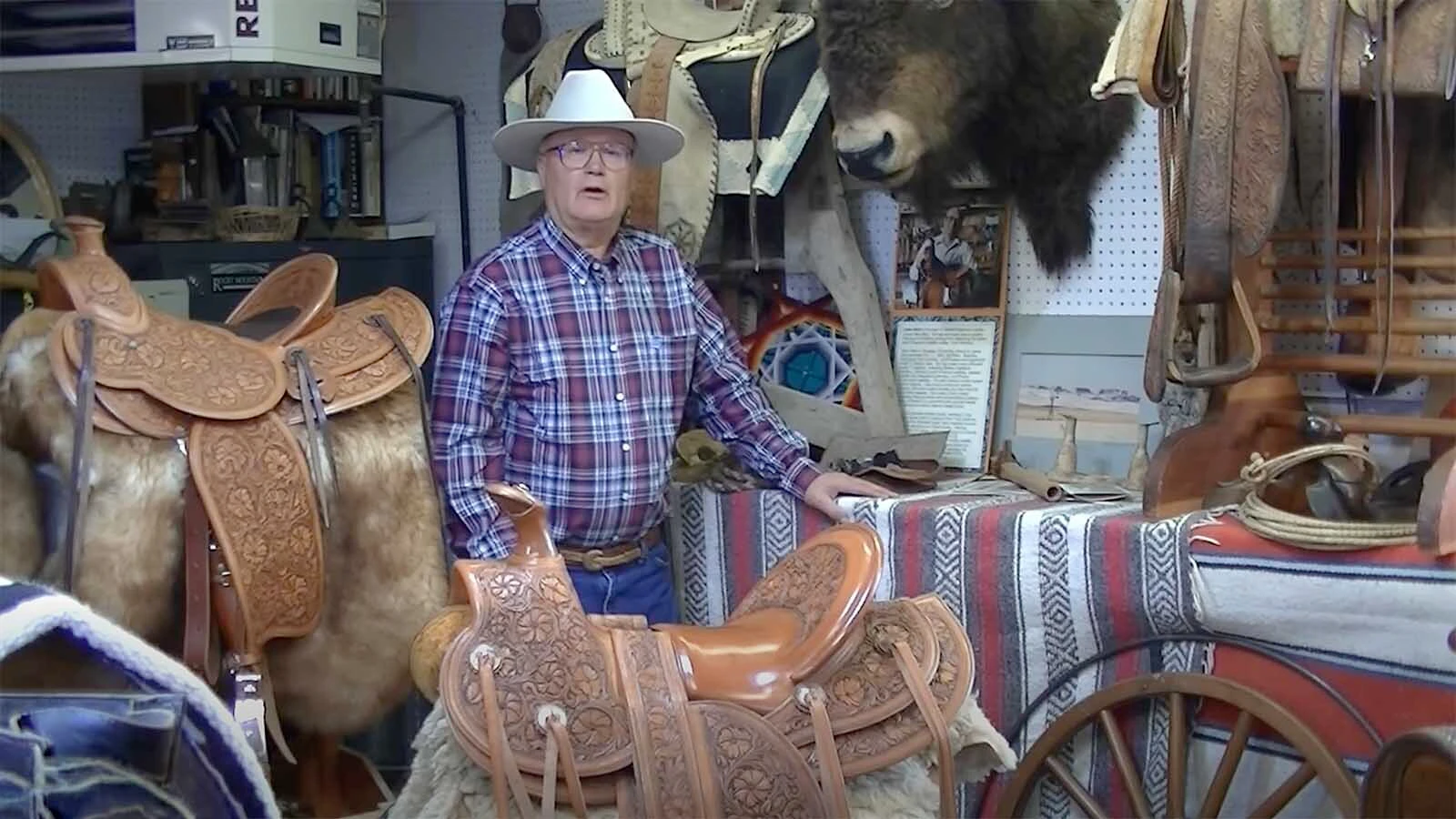 John L. Blair of Shell, Wyoming, is a master saddlemaker who commands more than $45,000 for a saddle, $15,000 for a leather bowl or $8,500 for a custom purse. He works listening to Mozart, one virtuoso inspiring another to create stunning leather art.