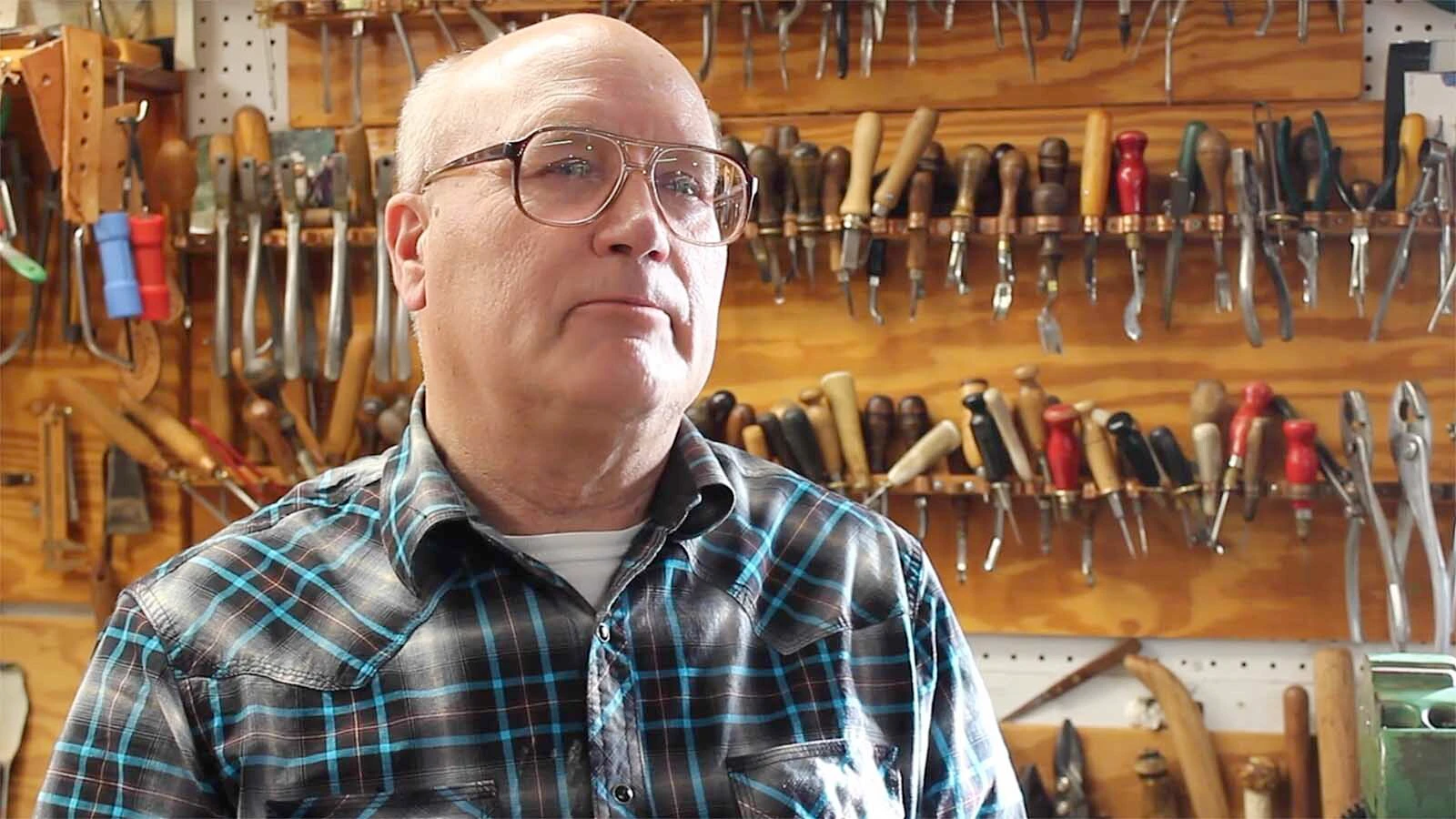 John L. Blair of Shell, Wyoming, is a master saddlemaker who commands more than $45,000 for a saddle, $15,000 for a leather bowl or $8,500 for a custom purse. He works listening to Mozart, one virtuoso inspiring another to create stunning leather art.