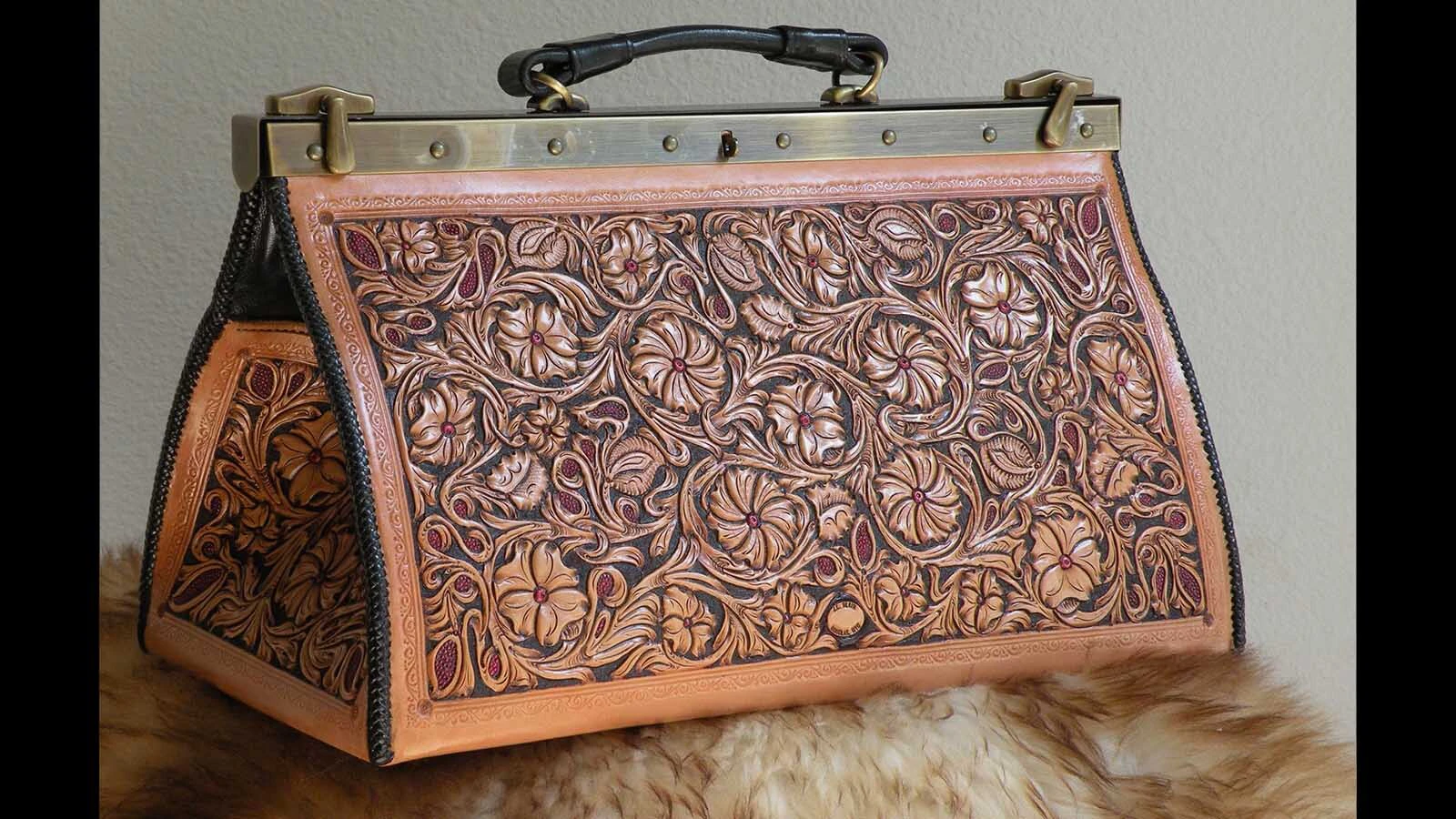 A physician's bag made by wyoming leatherworker and saddlemaker John L. Blair.