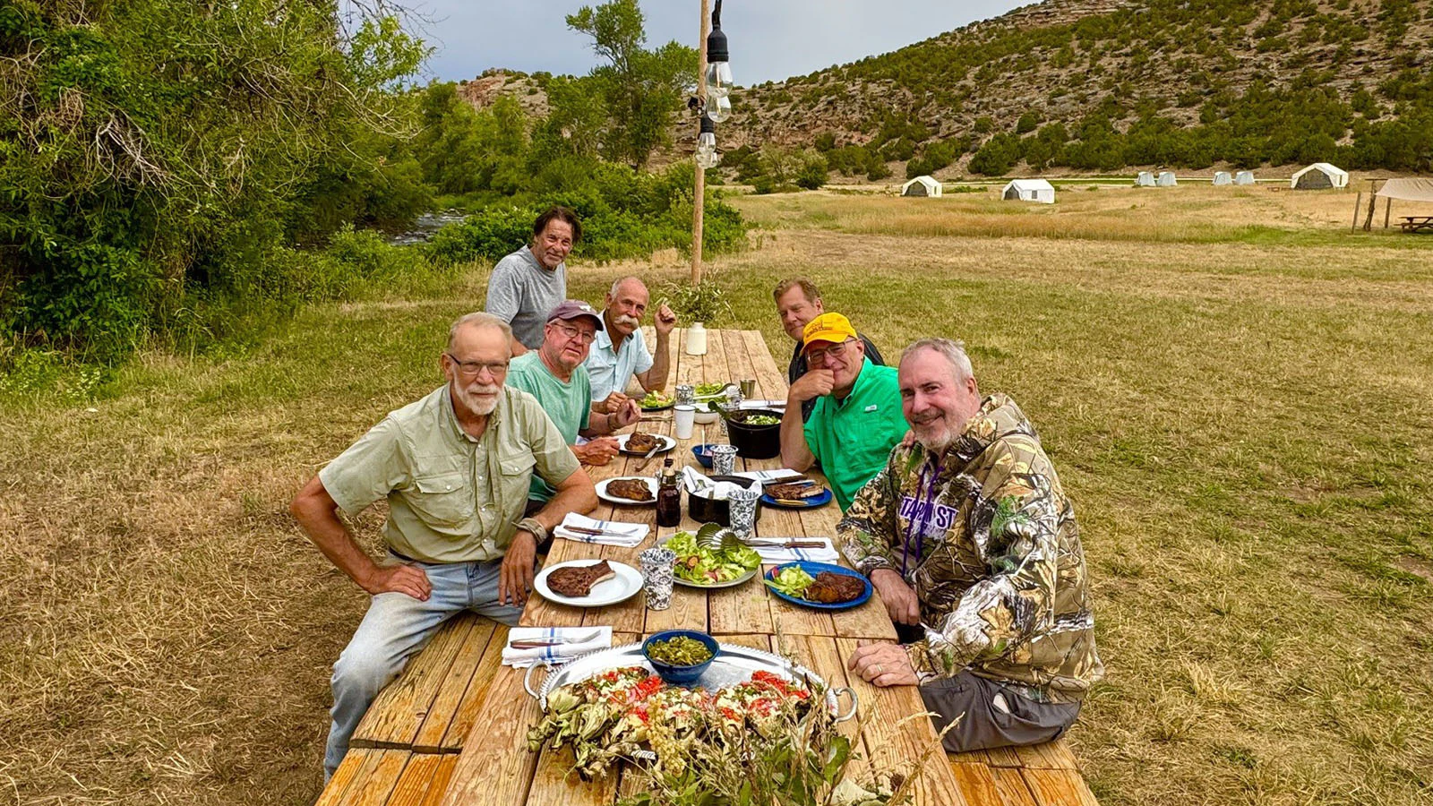 A group of longtime friends rides through the rugged Paintrock country near Hyattville during a July reunion.