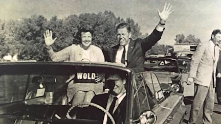 John and Jane Wold on parade during his political career.