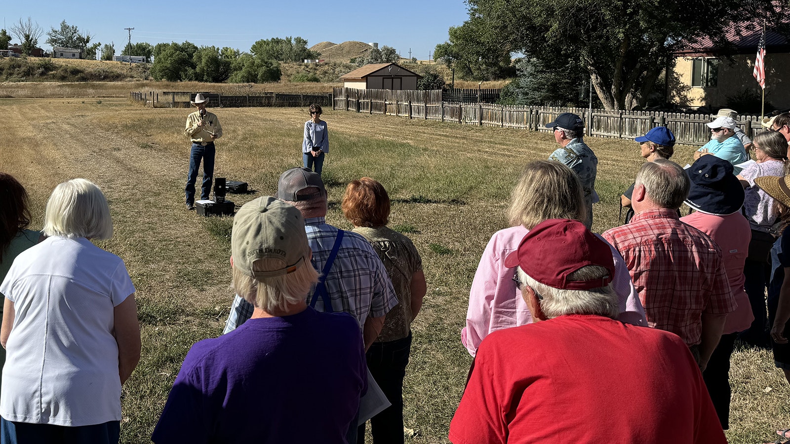 Laurel Foster and Brock Hanson stand in a vacant lot in Kaycee that was the site of the KC Ranch during the Johnson County War. The tool shed at the right marks the approximate location of the cabin where Nate Champion was surrounded by the invaders on April 8, 1892.