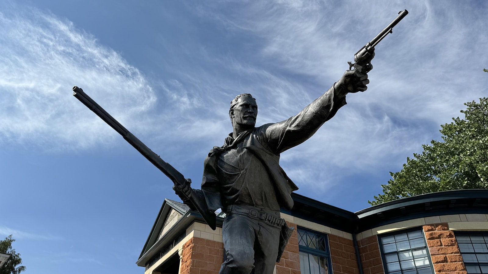 "Nate Champion's Last Run," a bronze sculpture by D. Michael Thomas, in Buffalo. Champion was surrounded in a cabin and held up the progress of the "invaders" before getting shot 28 times on April 9, 1892.