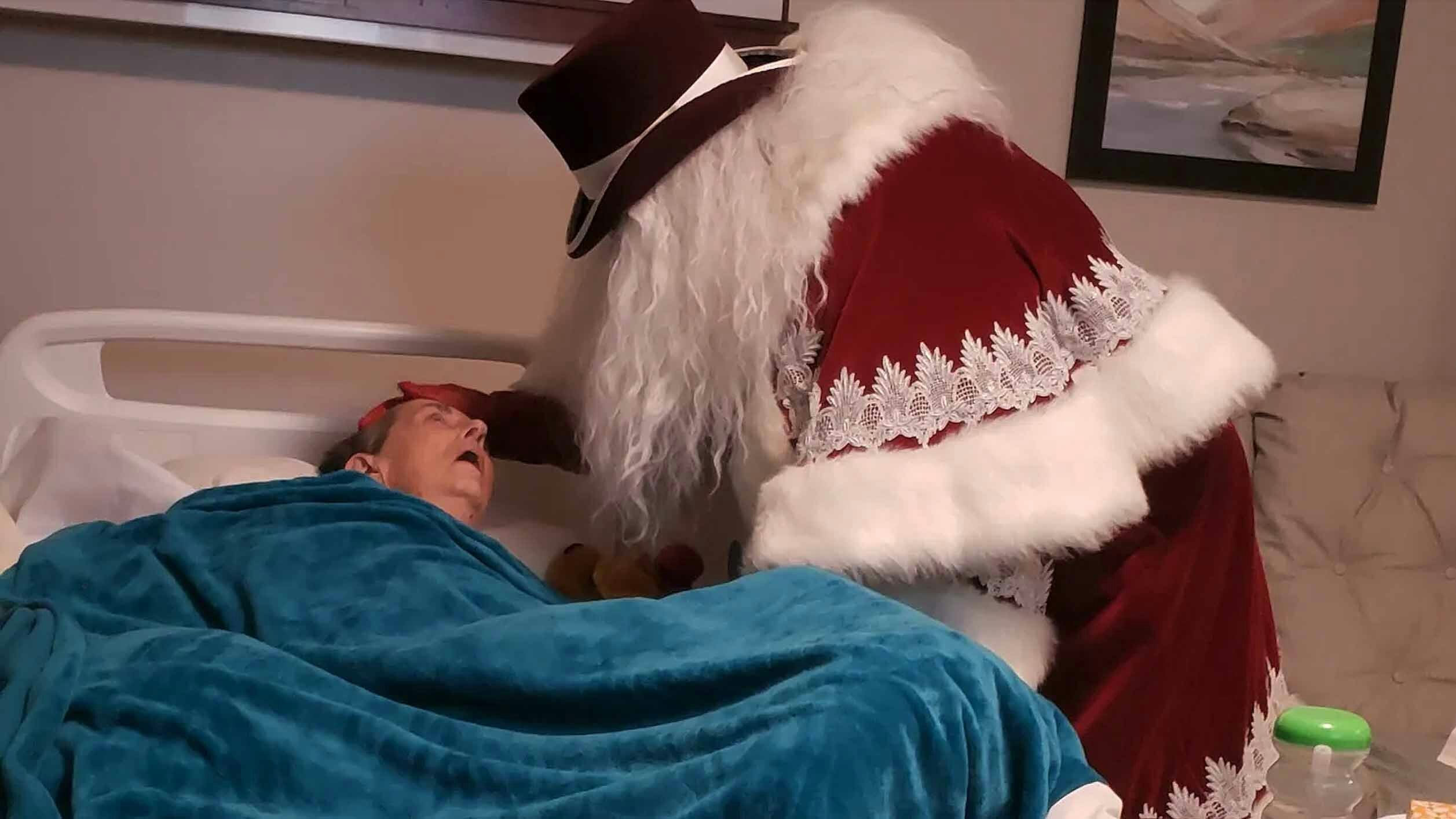 Casper food truck owner Ticker Lock transforms into the “Jolliest Claus,” a top-hatted Santa who entertains kids at events, home visits and parades. He mixes humor, heartfelt moments and faith while keeping his own naughty list. Here Lock visits his mother in hospice care.