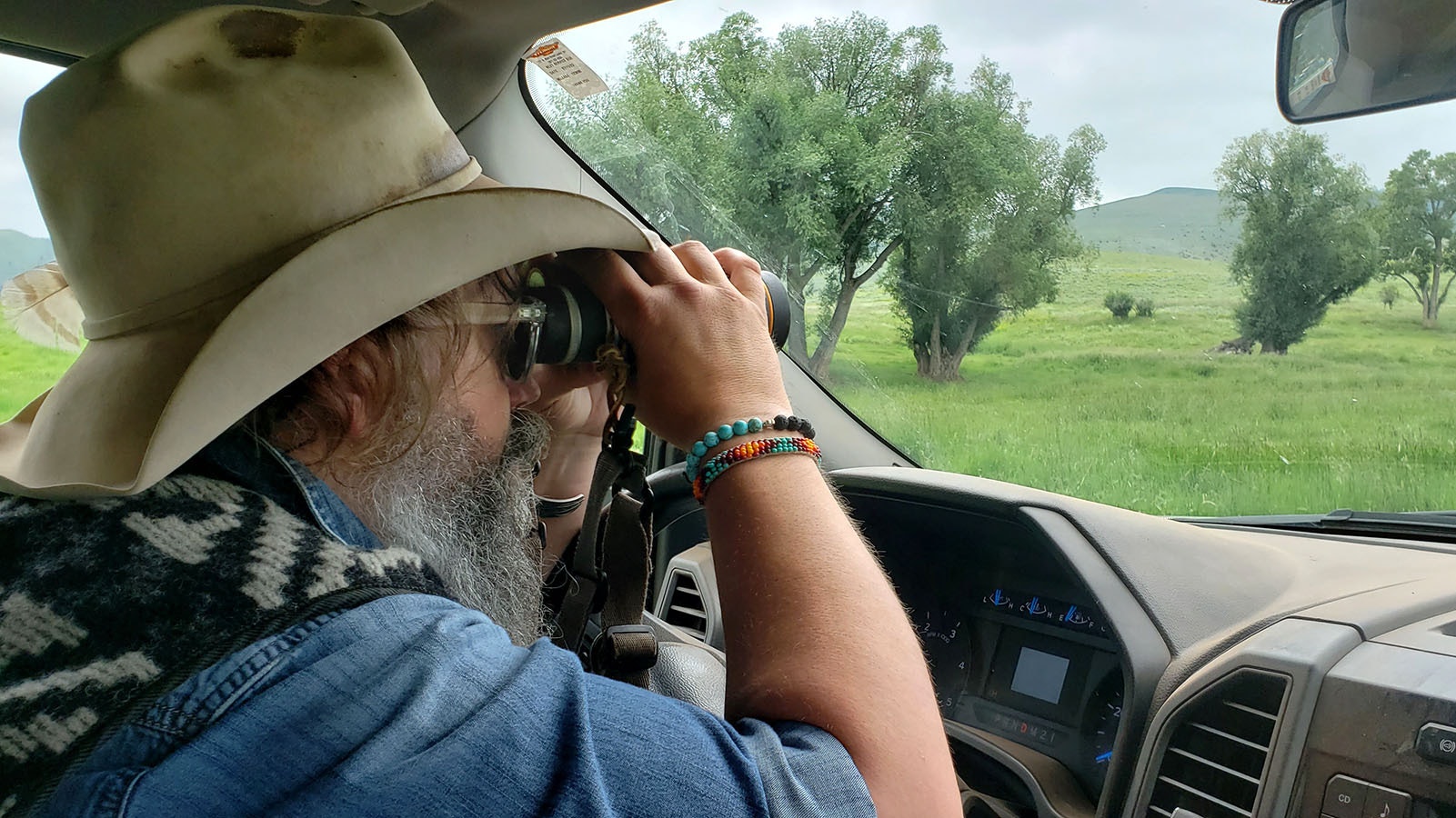 Josh Kirk checks on his 400-head bison herd in Fremont County, Wyoming. He's being featured on History Channel's "Mountain Men" series.