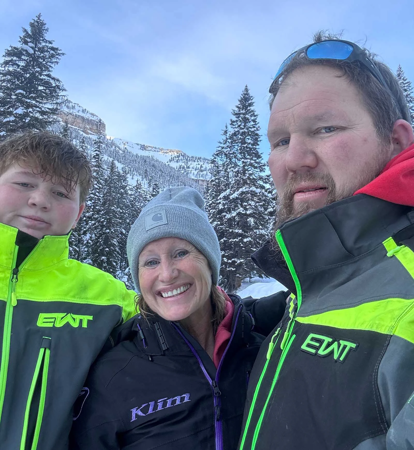 Joshua Voges with his family snowmobiling in Encampment where he hopes ot move someday.