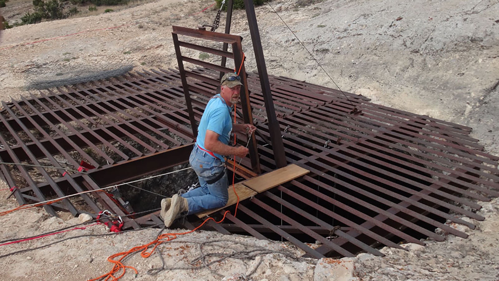 Steve Langendorg, a South Dakota caver, working on the entrance to Natural Trap Cave.