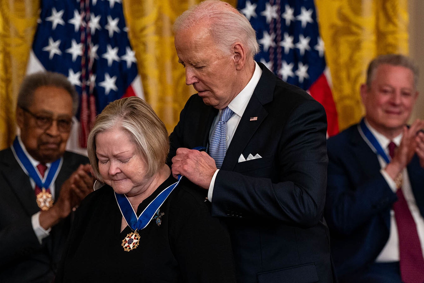 President Joe Biden presents the Presidential Medal of Freedom to Judy Shepard, mother of the late Matthew Shepard and founder of the foundation named in his honor, during a ceremony in the East Room of the White House on May 3, 2024, in Washington, D.C. President Biden awarded the Presidential Medal of Freedom, the Nation's highest civilian honor, to 19 individuals including political leaders, civil rights icons and other influential cultural icons.