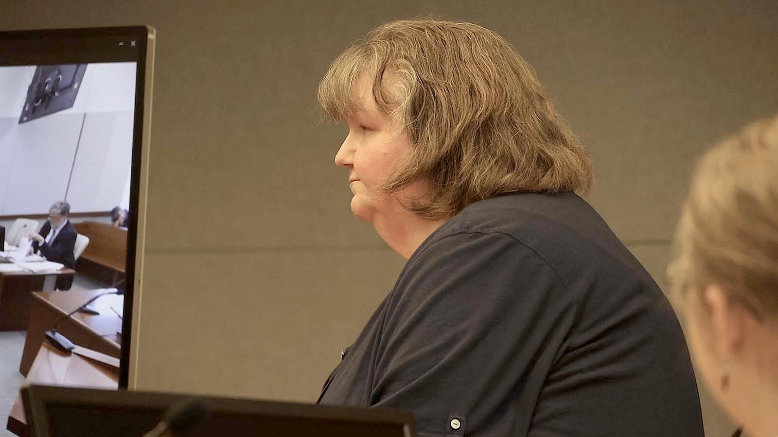 A 50-year-old Casper woman pleaded not guilty Thursday to charges related to tying a patient’s head to a bed as she worked a night shift at a Casper care facility. She faces a potential 10-year prison sentence.