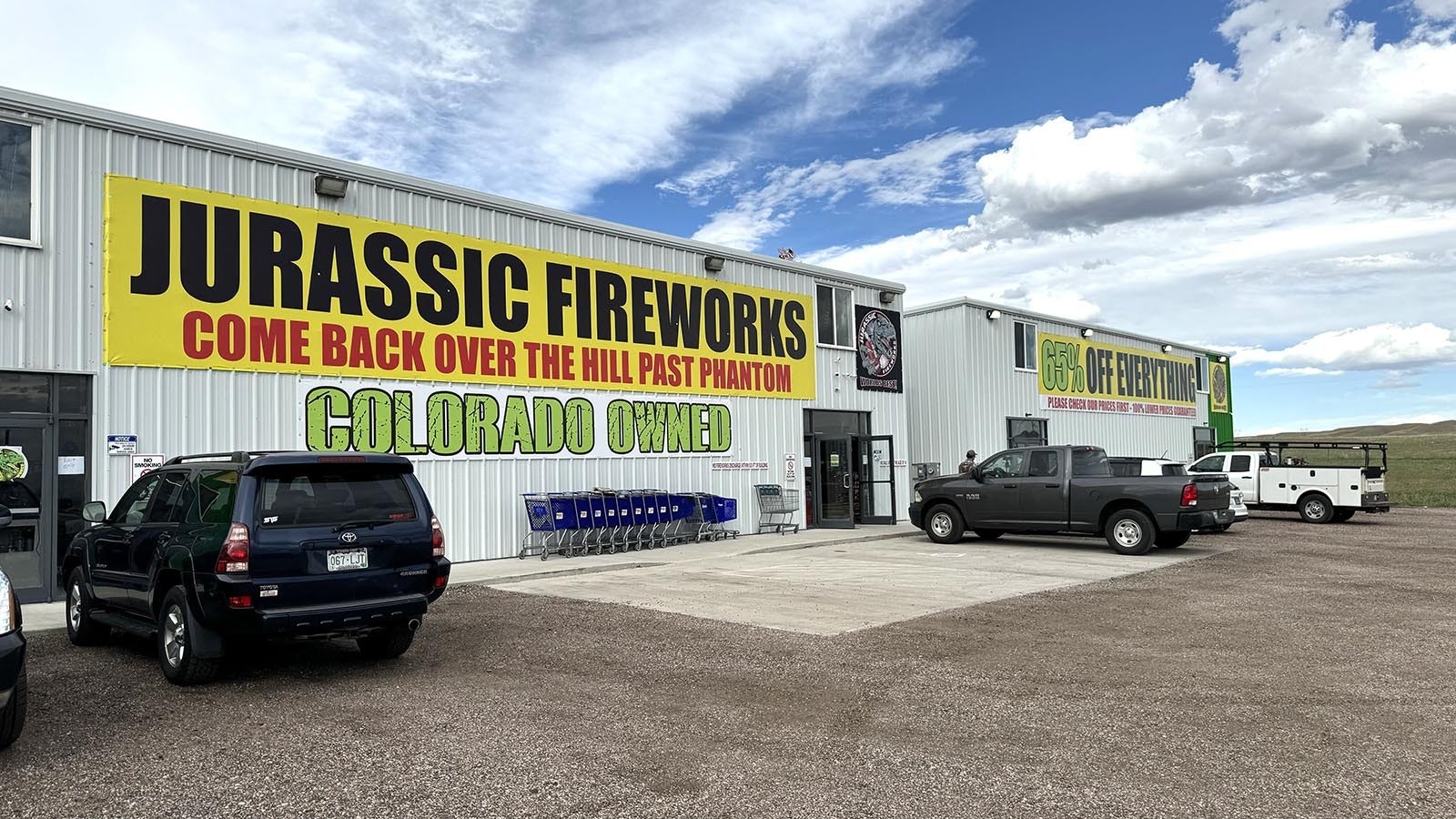 Jurassic Fireworks is one of two Colorado-owned fireworks stands just north of the Wyoming-Colorado border that are open again after a judge temporarily blocked a Laramie County decision to pull their business permits.