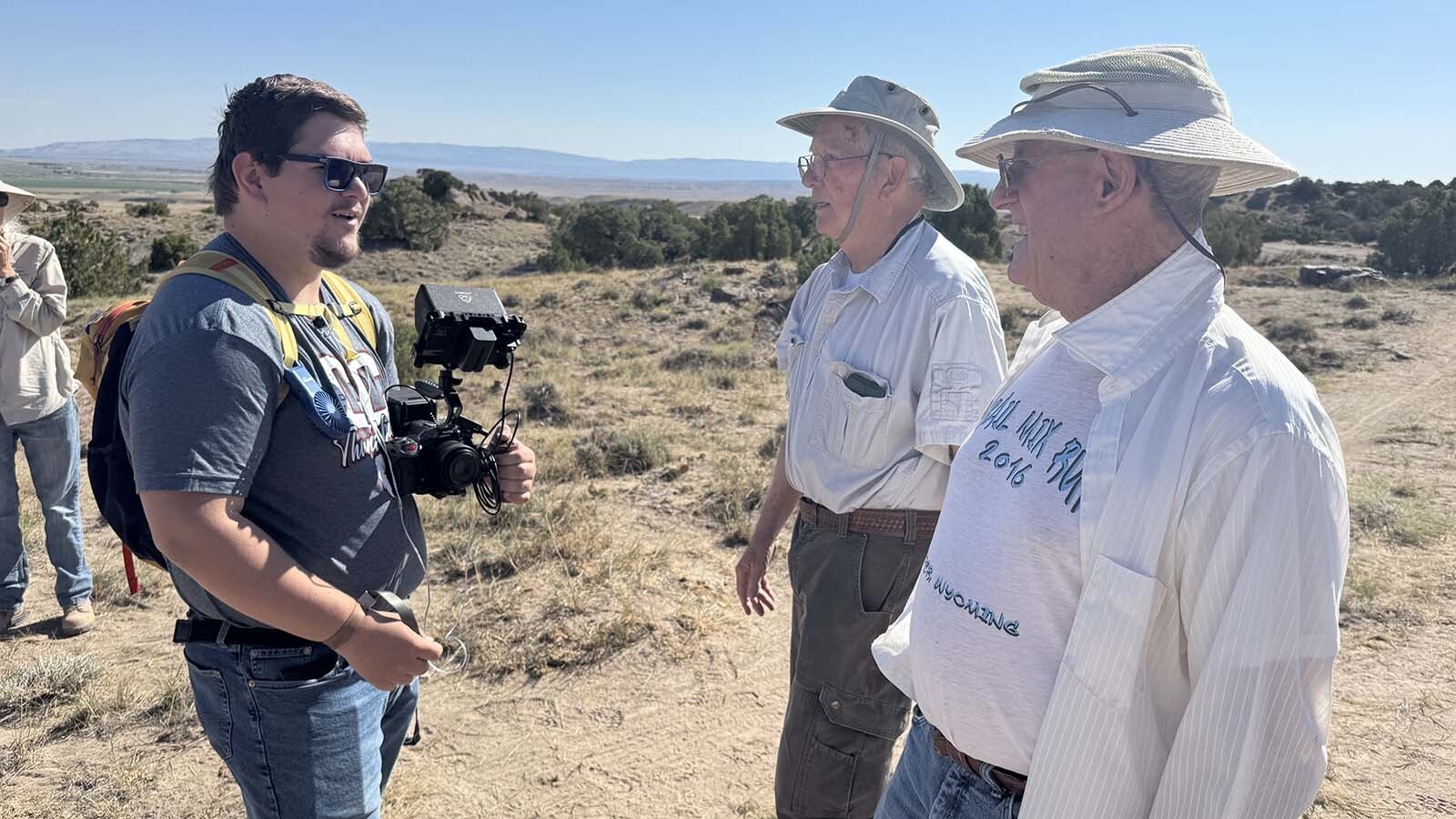 Allan Fraser and Woody Motten arrive at the site of "Woody's Dinosaur" on jacket extraction day. Fraser and Motten, friends and scientists, discovered the partial sauropod skeleton over a decade ago and continue to explore the hills near Alcova Reservoir for other spectacular fossil finds.