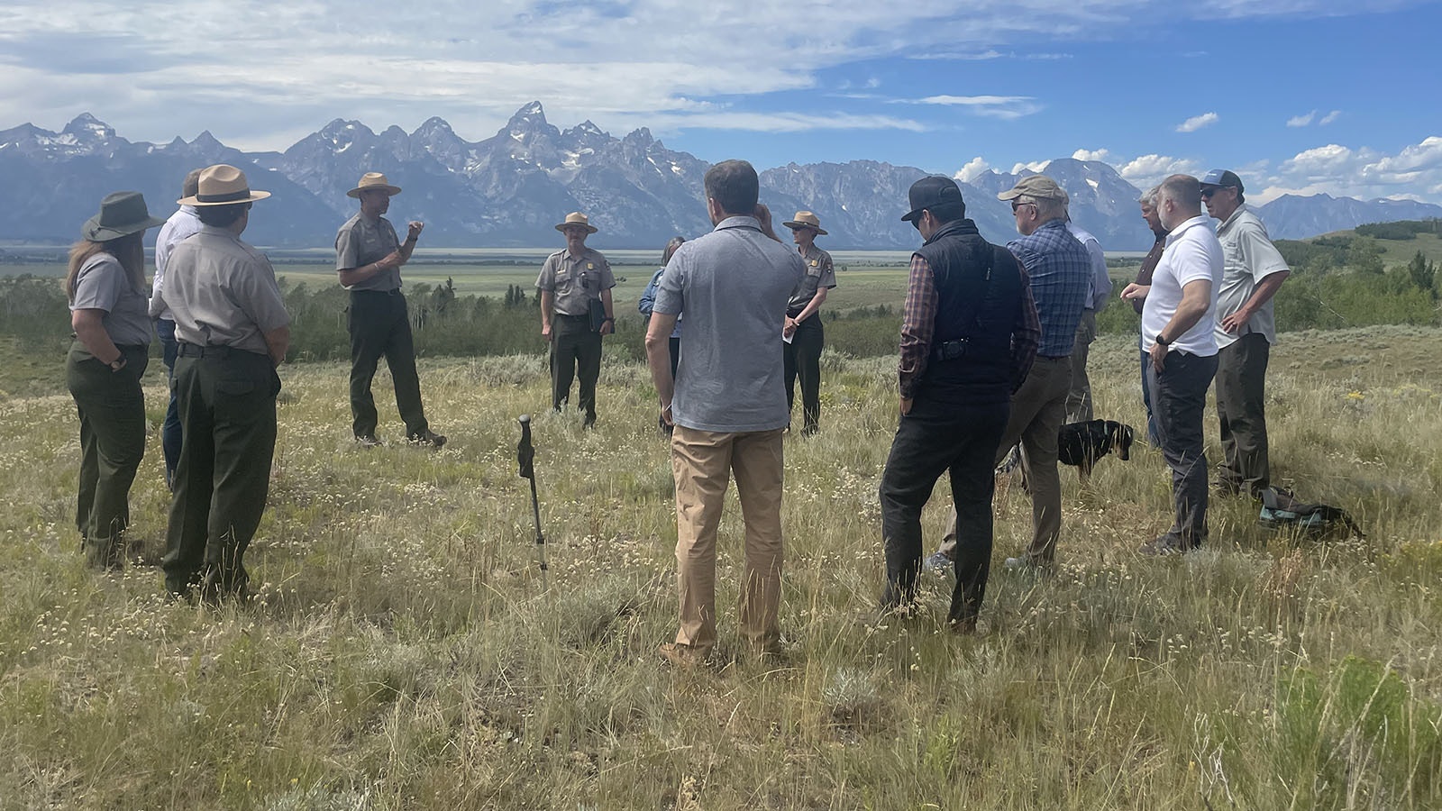 A group of National Park and other officials visit the Kelly parcel in Teton County.