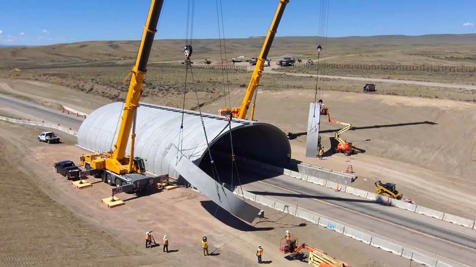 Crews work on the arch structure for a wildlife overpass on U.S. Highway 189 near Kemmerer.