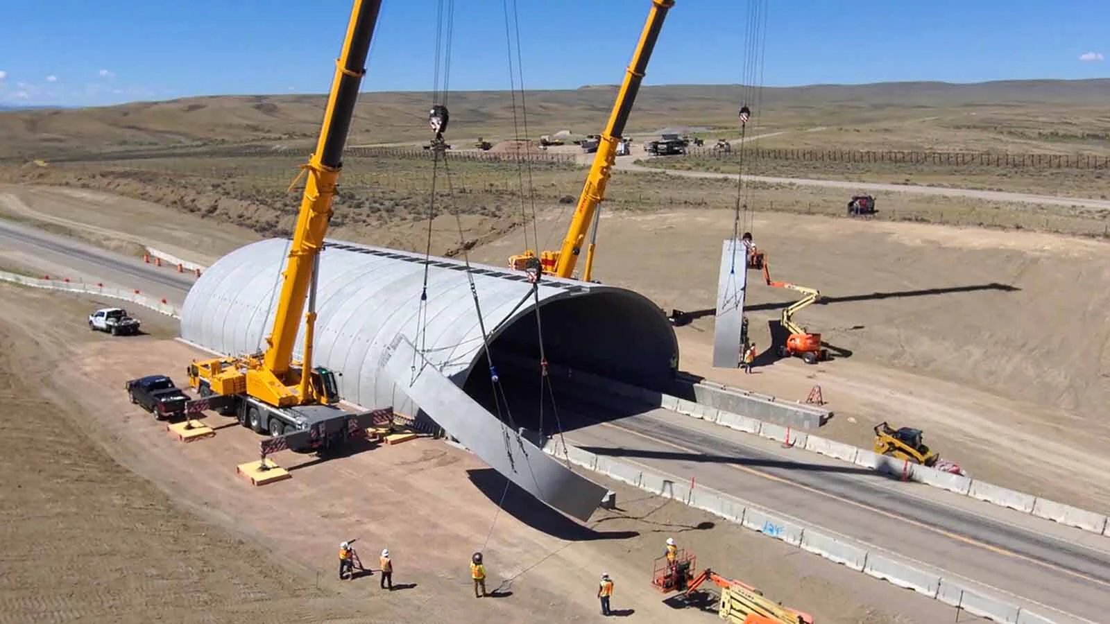 Crews work on the arch structure for a wildlife overpass on U.S. Highway 189 near Kemmerer.