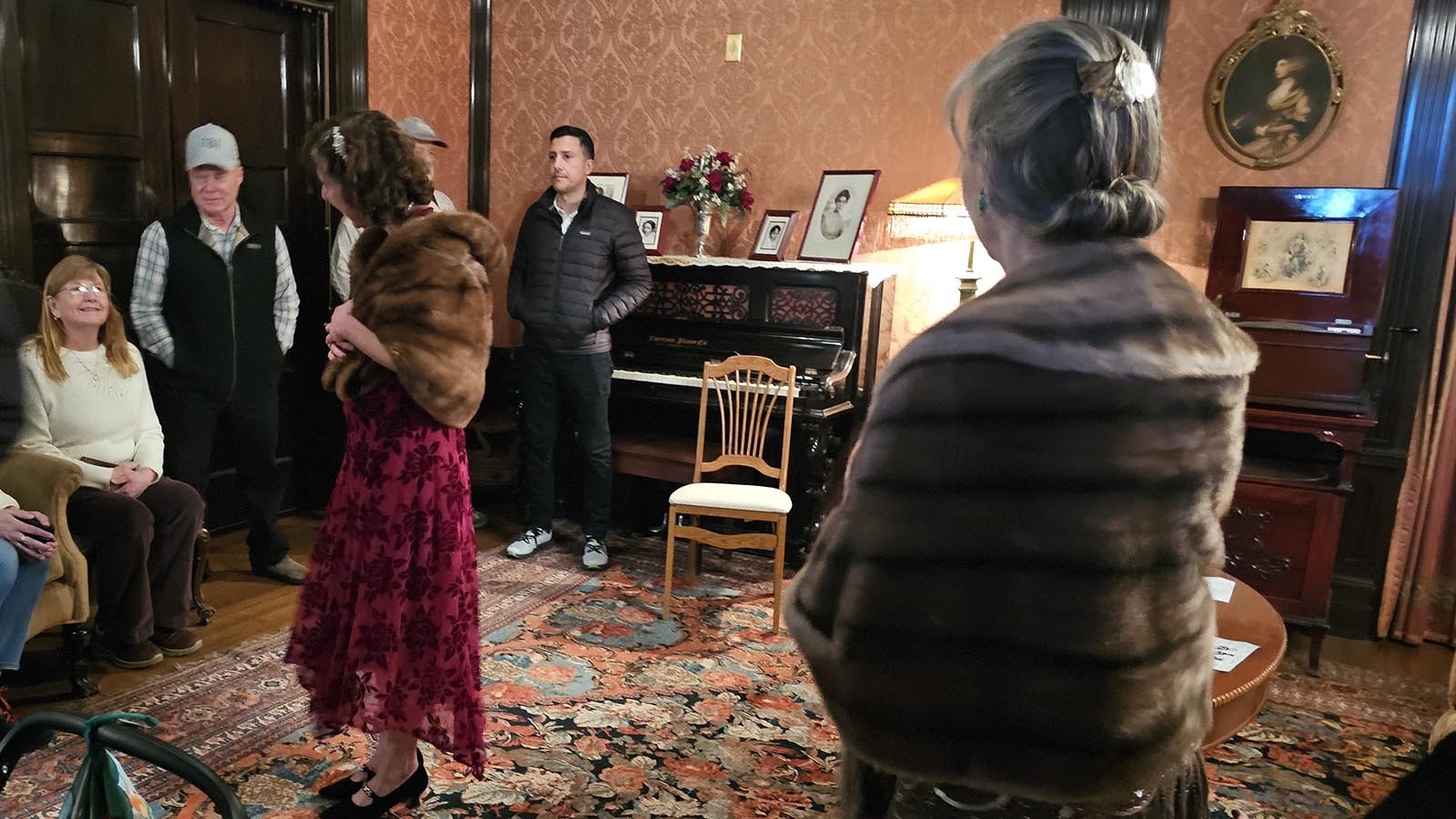 Mrs. Eula Wulfjen Kendrick, played by Barbara Cavanagh, center, talks with her latest guests for a 1924 vintage Christmas with the Kendricks, while one of her two friends, Mattie Wulfjen Williams (Michelle King) and Madge Eggleston (Kathy Pavatt)  looks on.