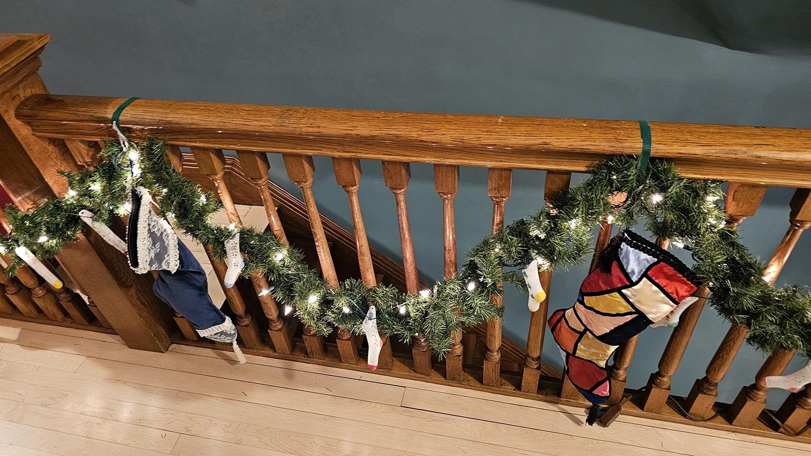 Christmas stockings are not just hung by the chimney with care. They also decorate the stairwells at the Kendrick Mansion in Sheridan.