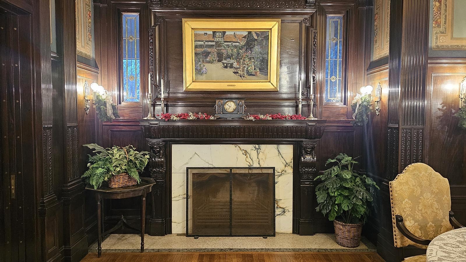 The dining room includes a lovely fireplace.