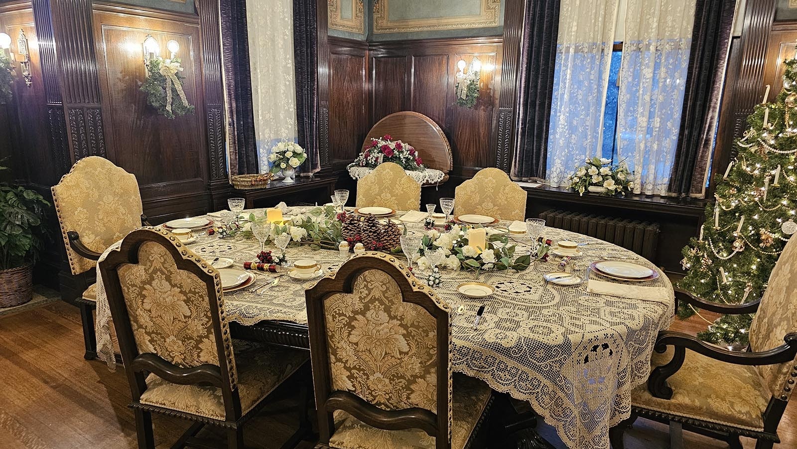 A beautiful table is set for dinner, which will  have duck as the main course and a baked Alaska for dessert.