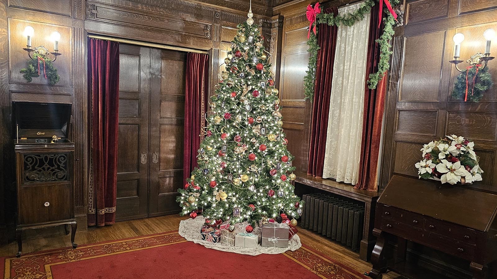 A grand Christmas tree in the foyer at  the Kendrick Mansion in Sheridan.