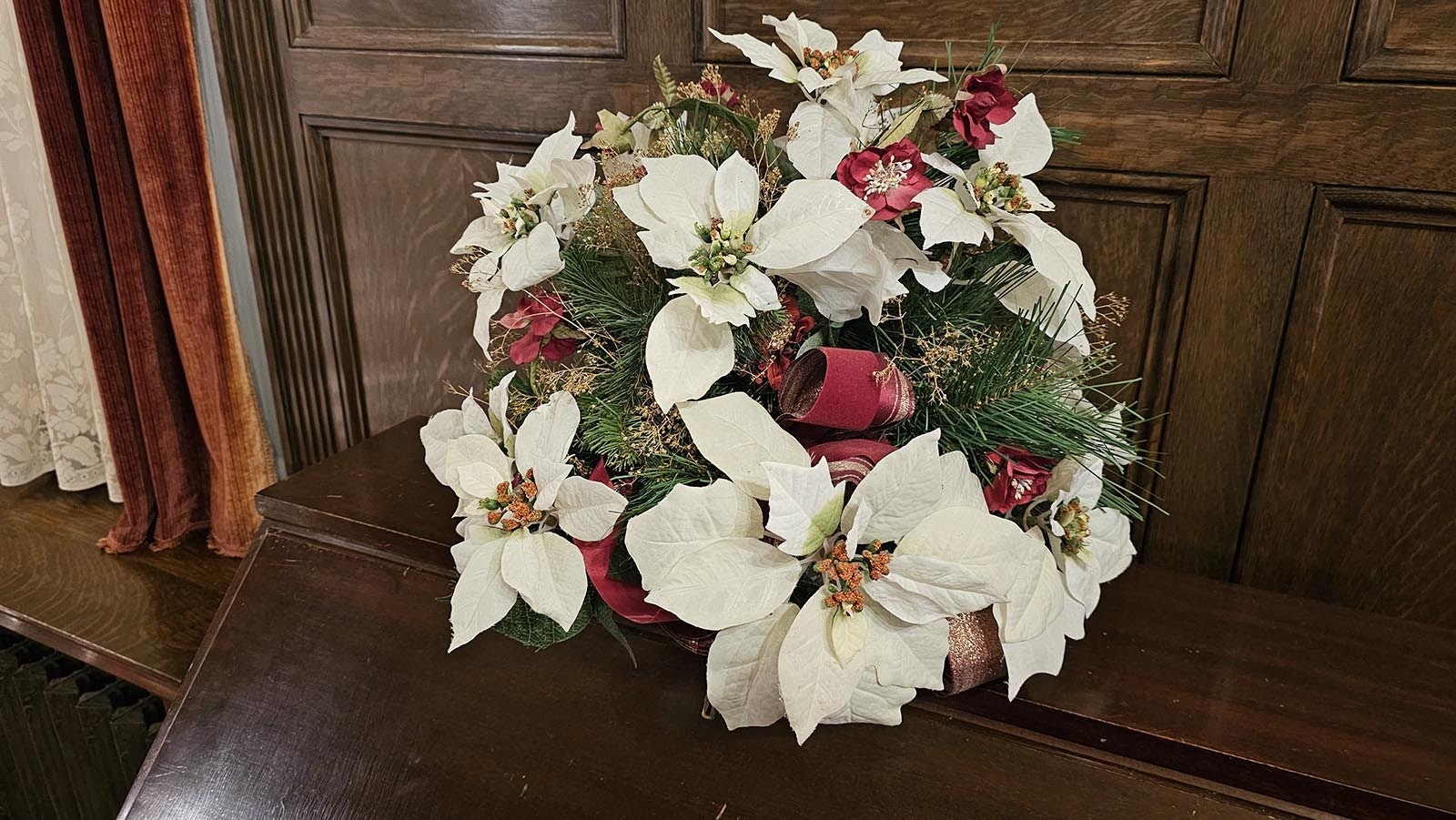 A beautiful arrangement of white poinsettias at the Kendrick Mansion in Sheridan.