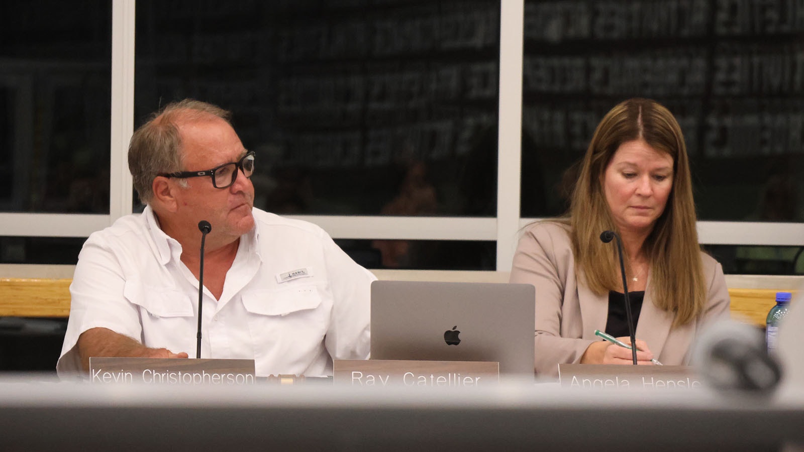 Natrona County School District Chairpman Kevin Christopherson, left, was criticized Monday for a social media post calling the local Moms For Liberty group "Moms for Tyranny." At right is district Superintendent Angela Hensley.