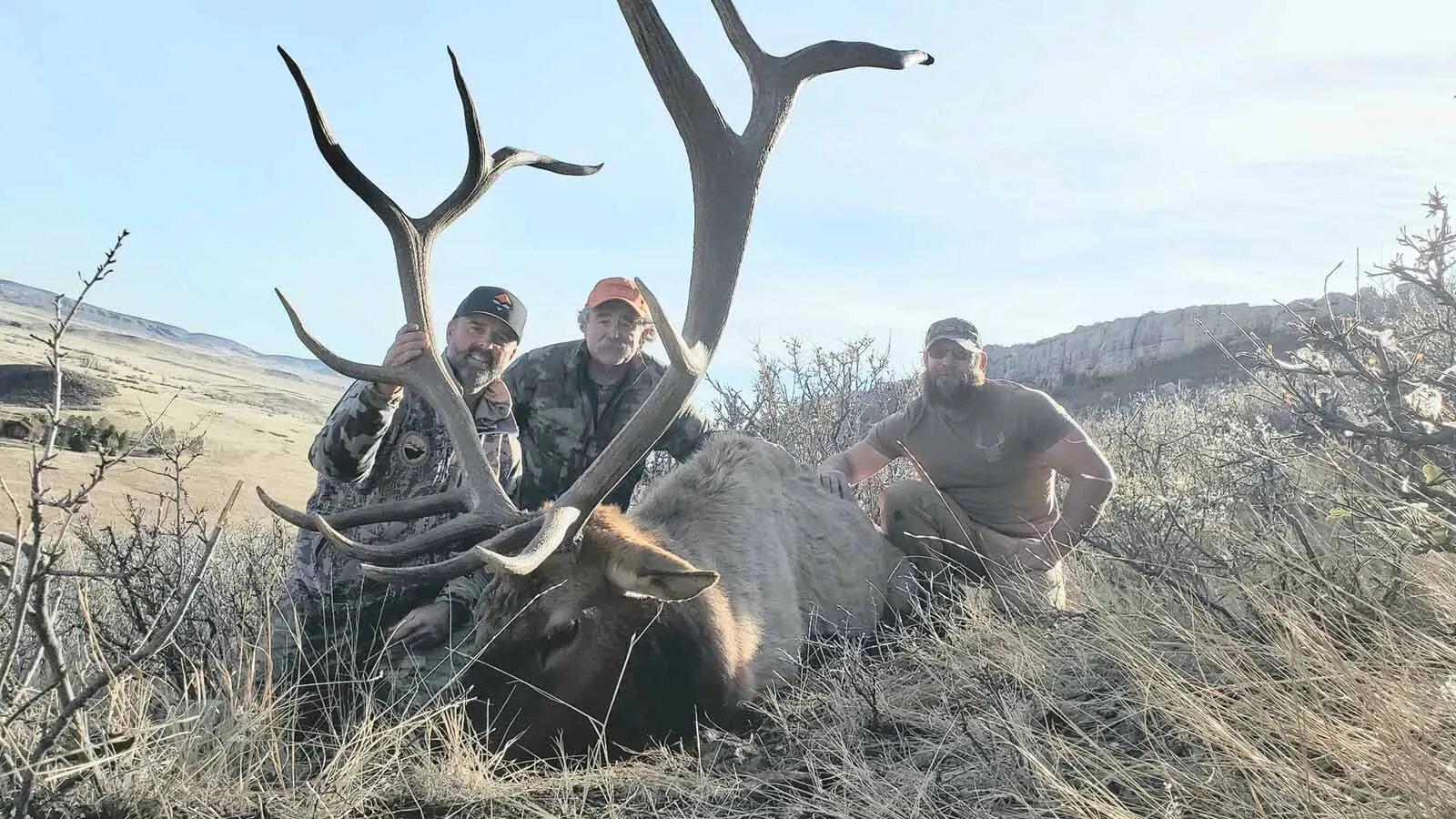 Wyoming outfitter Dax McCarty (left) is pictured here with hunter Ernie Dosio, of California (center) and hunting guide AJ Henson. McCarty was good friends with Dosio, who was killed by an elephant in Africa.