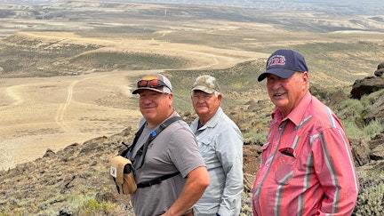 Guides for the trip were, from left, Shane White, Perry Roberson and Pat White. This view is from the summit of Steamboat Mountain. The Oregon Buttes can be seen in the distance.