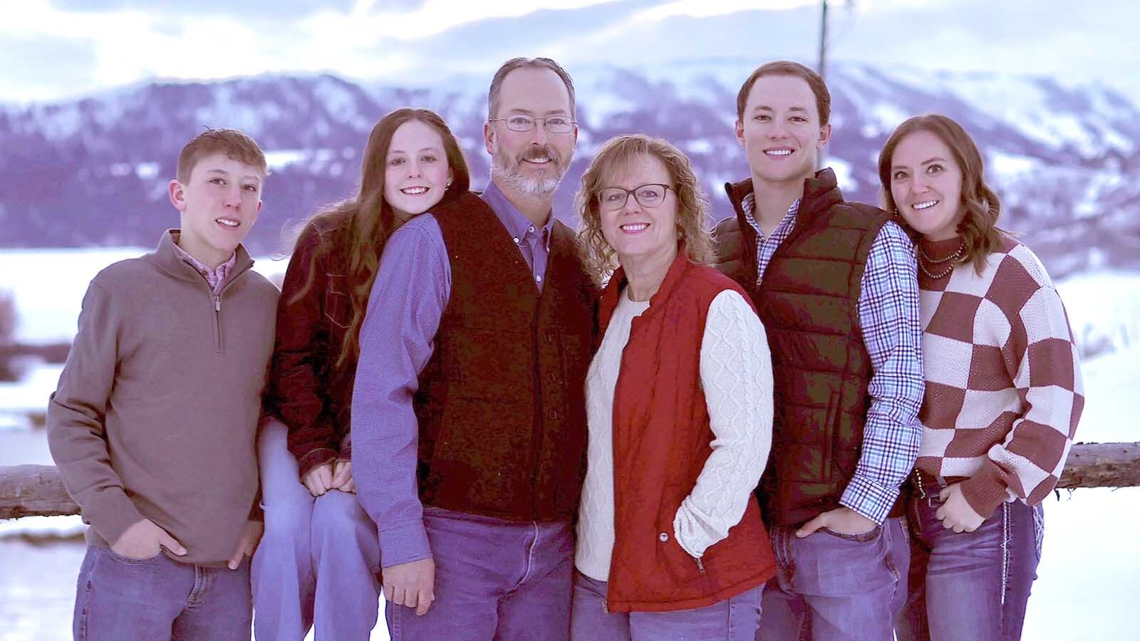 Kimberly Choma, far right, with her family. Her parents say she was someone who gave her all to help others. “If you knew her, you knew her,” Bob Choma, pictured third from left, said.