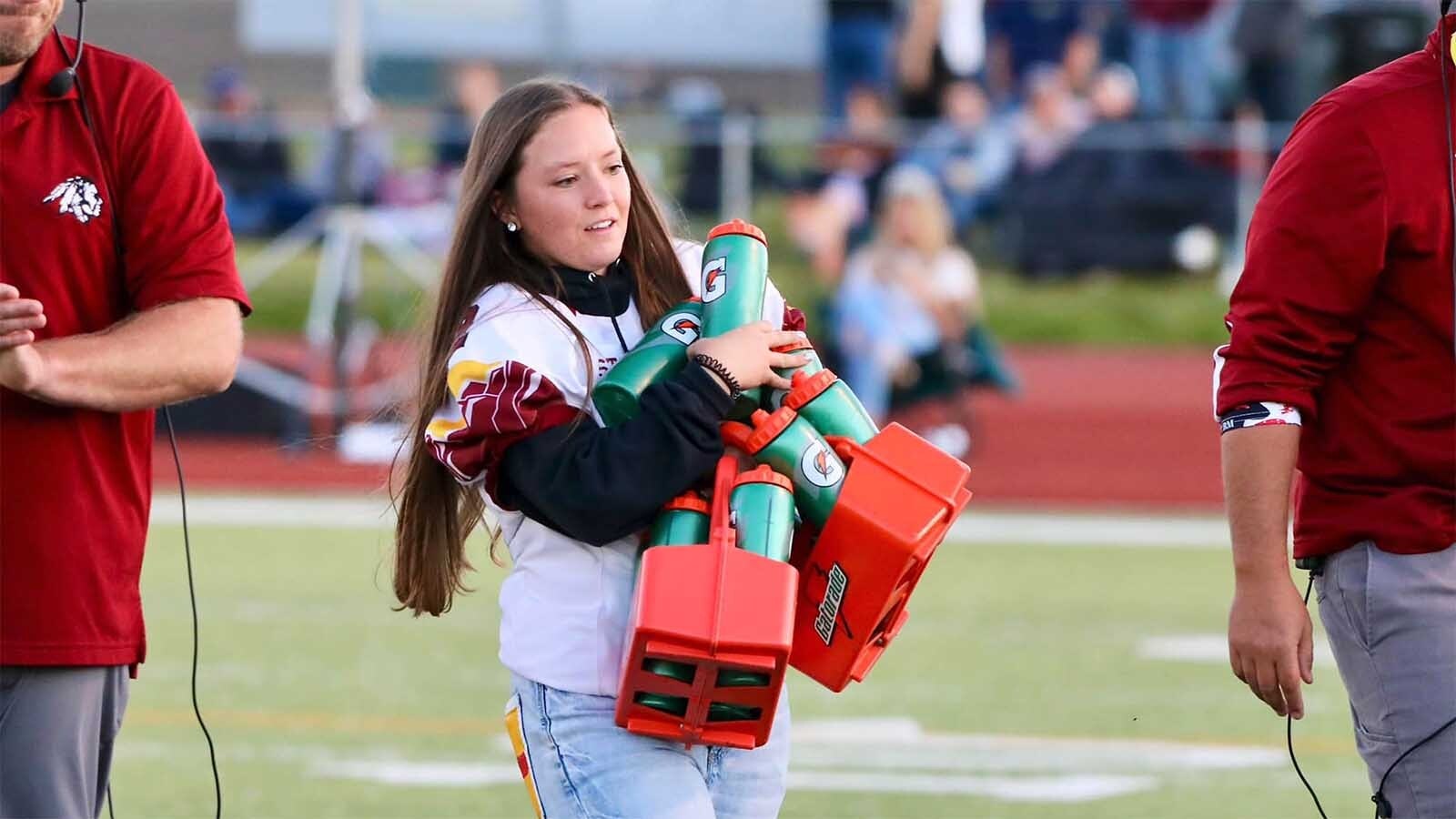 Star Valley and the UW football program are stunned and saddened by the sudden death Thursday of a 21-year-old equipment manager. Kimberly Choma, who died in a lawn mower accident, “loved people” and led by example with her “Christ-like attitude.”