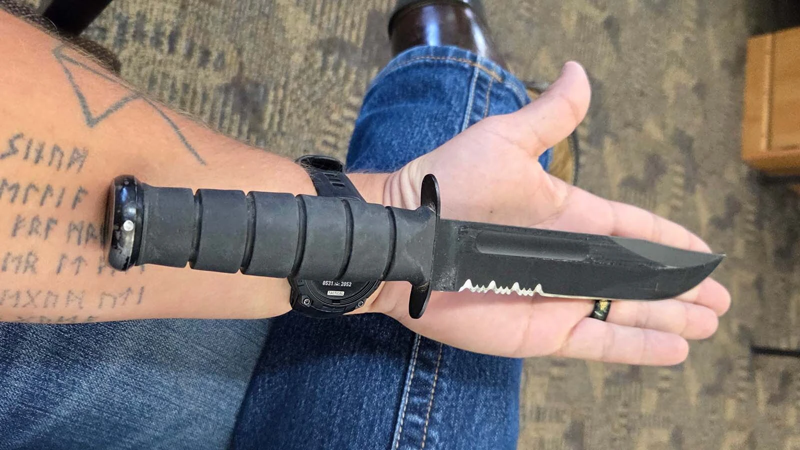 Dylan Sparks of Buffalo open carries a large Ka-Bar (or K-Bar) fixed-blade knife with him wherever he goes. Wyoming law permits carrying such knives, but it’s illegal to carry them in some other states.