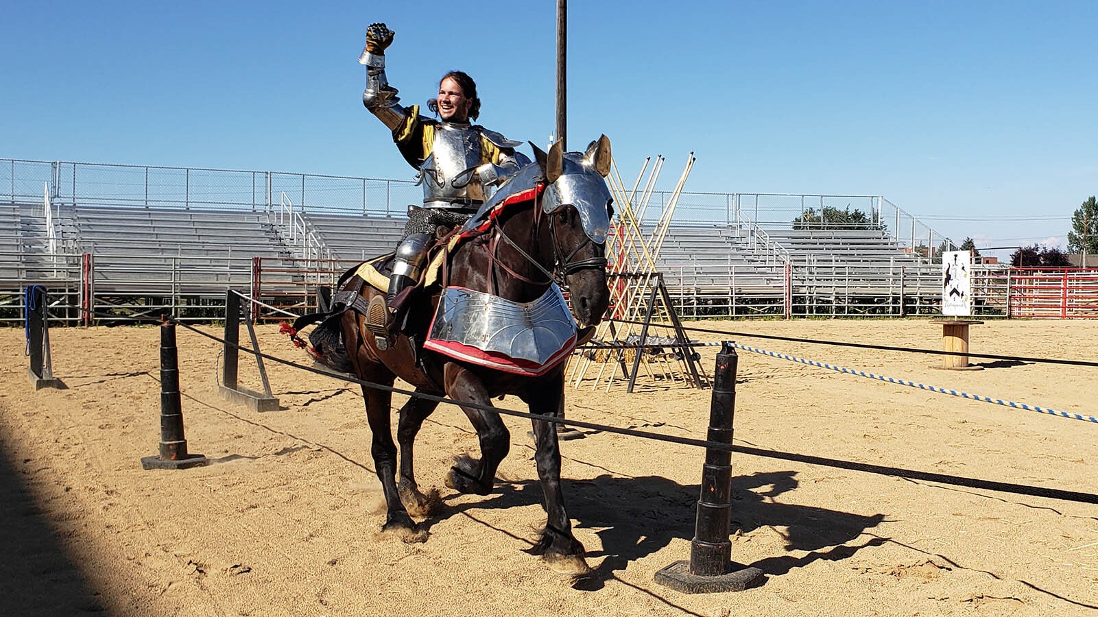 Andrew Hoffman raises his arm to the crowd prior to a jousting match during the recent Tournament of Knights in Sheridan.