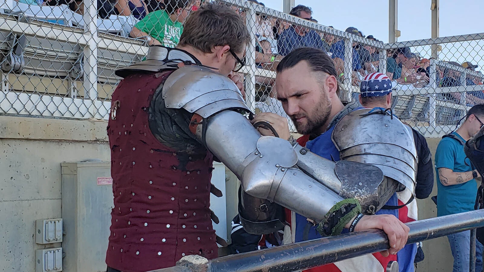 Colorado Wardens Captain Greg Fisher right adjusts Benjamin Splitter's armor before a session of hand-to-hand foot combat.