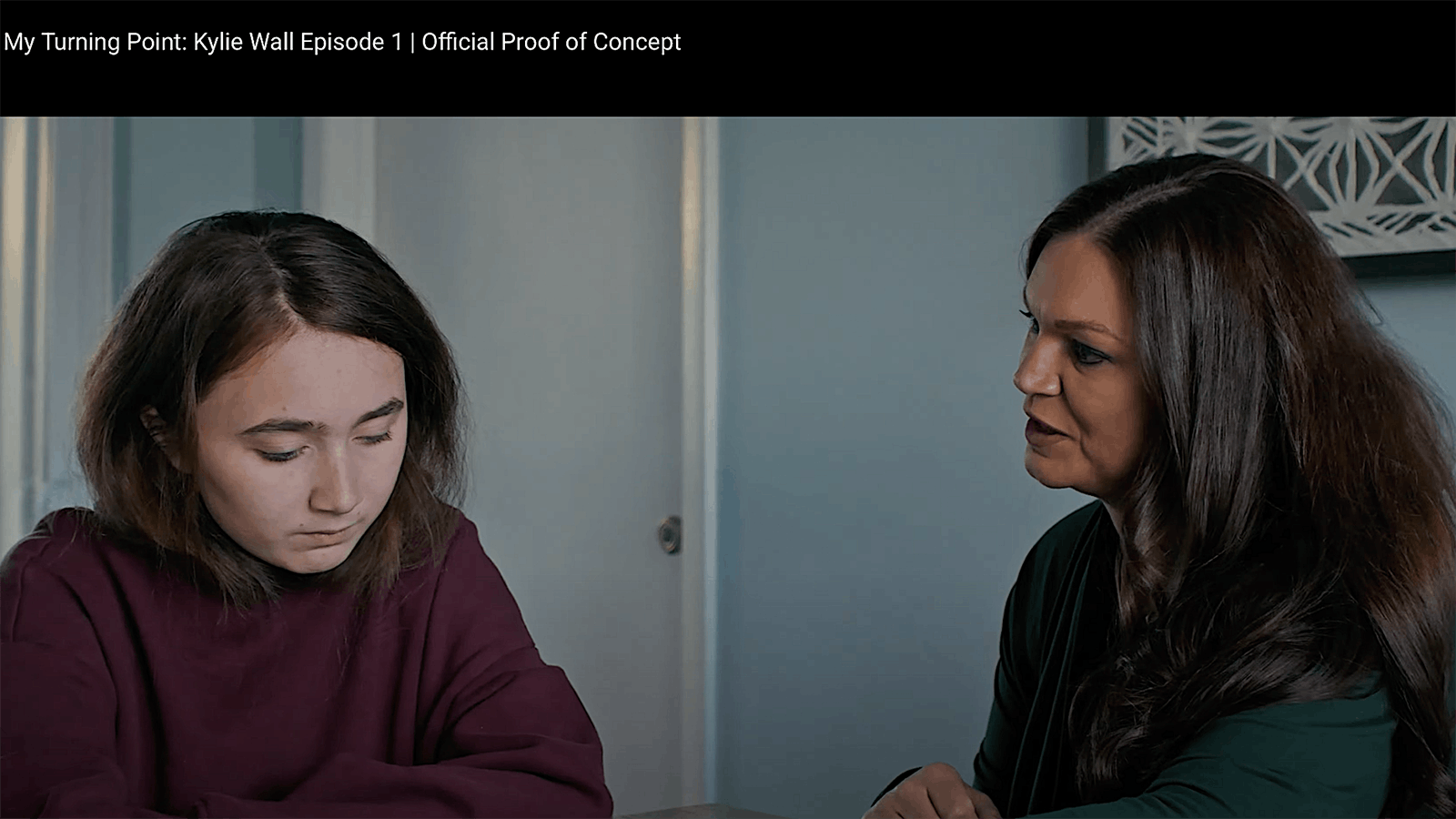 A scene from the "My Turning Point: Kylie Wall Episode 1” proof-of-concept video shows actors portraying Wall and her mother in conversation following Charlie Kirk’s death.