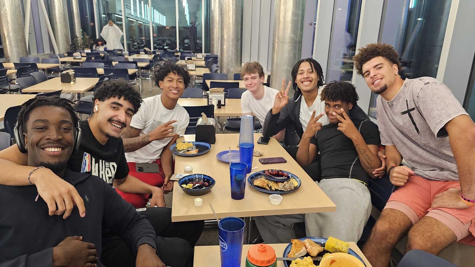 Members of Laramie County Community College's mens' basketball team, from left, Matt Tily Charon of France, Karim Elgizawy of Egypt, T.J. Coulter of Nevada, Lewis Dyer of Florida, Isaac Fiagbe of London, Josiah Ochoa of Dubai, and Brevin Phillips of Iowa, didn't realize LCCC is changing its name. About half would keep the name as is. The other half favored  L-Trip, for its current acronym, LCCC.