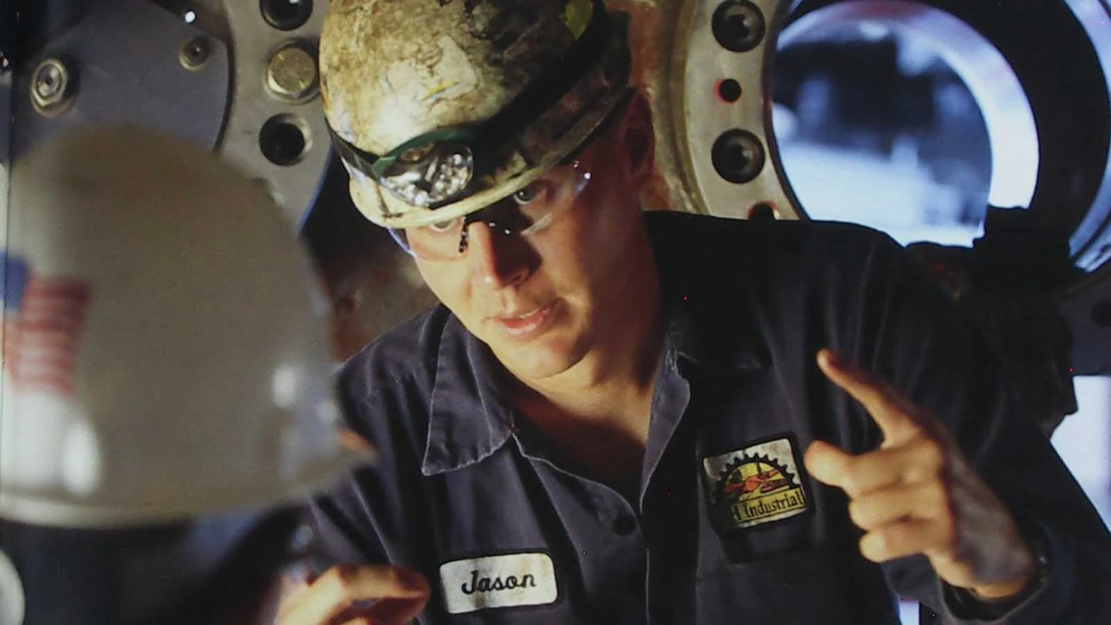 L&H Industrial co-owner Jason Perdifield works on the NASA crawler transporter.