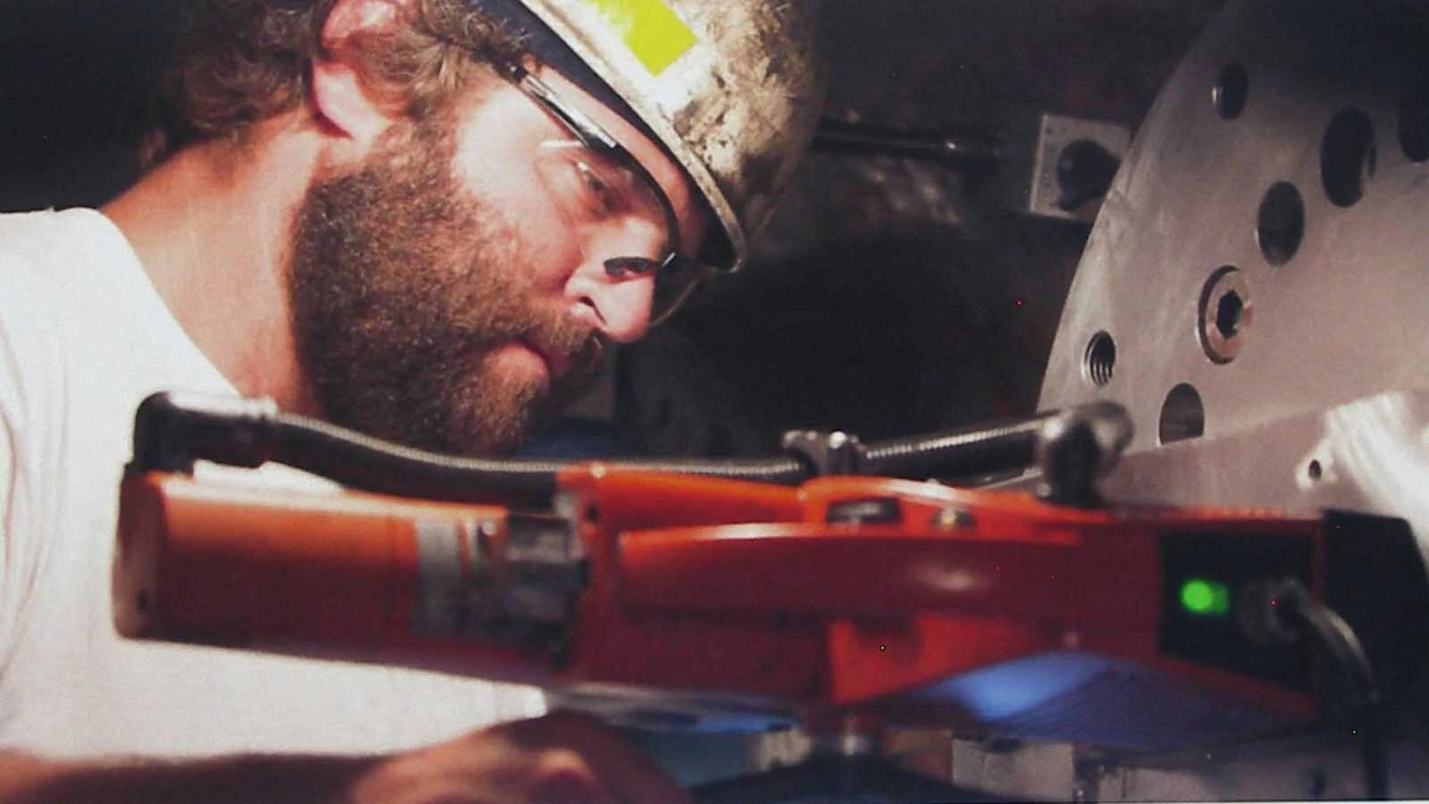Luke Sigman works on the NASA crawler retrofit for Gillette, Wyoming-based L&H Industrial.
