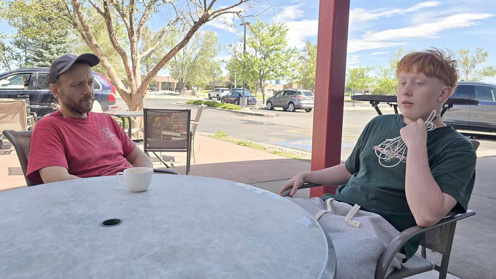 Colton Loetscherl, right, talks about why he likes working at L'Osteria Mondello while his boss, Jasmin "Dave" Agovic looks on.