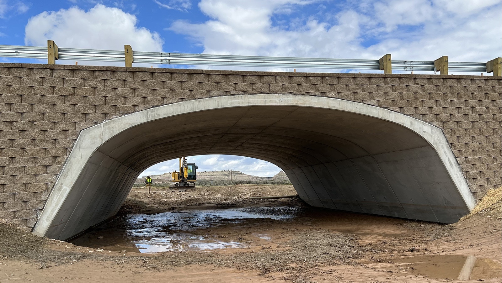 A construction crew works Monday on one of several wildlife underpasses between La Barge and Big Piney on U.S. Highway 189 — a stretch notorious for roadkill.