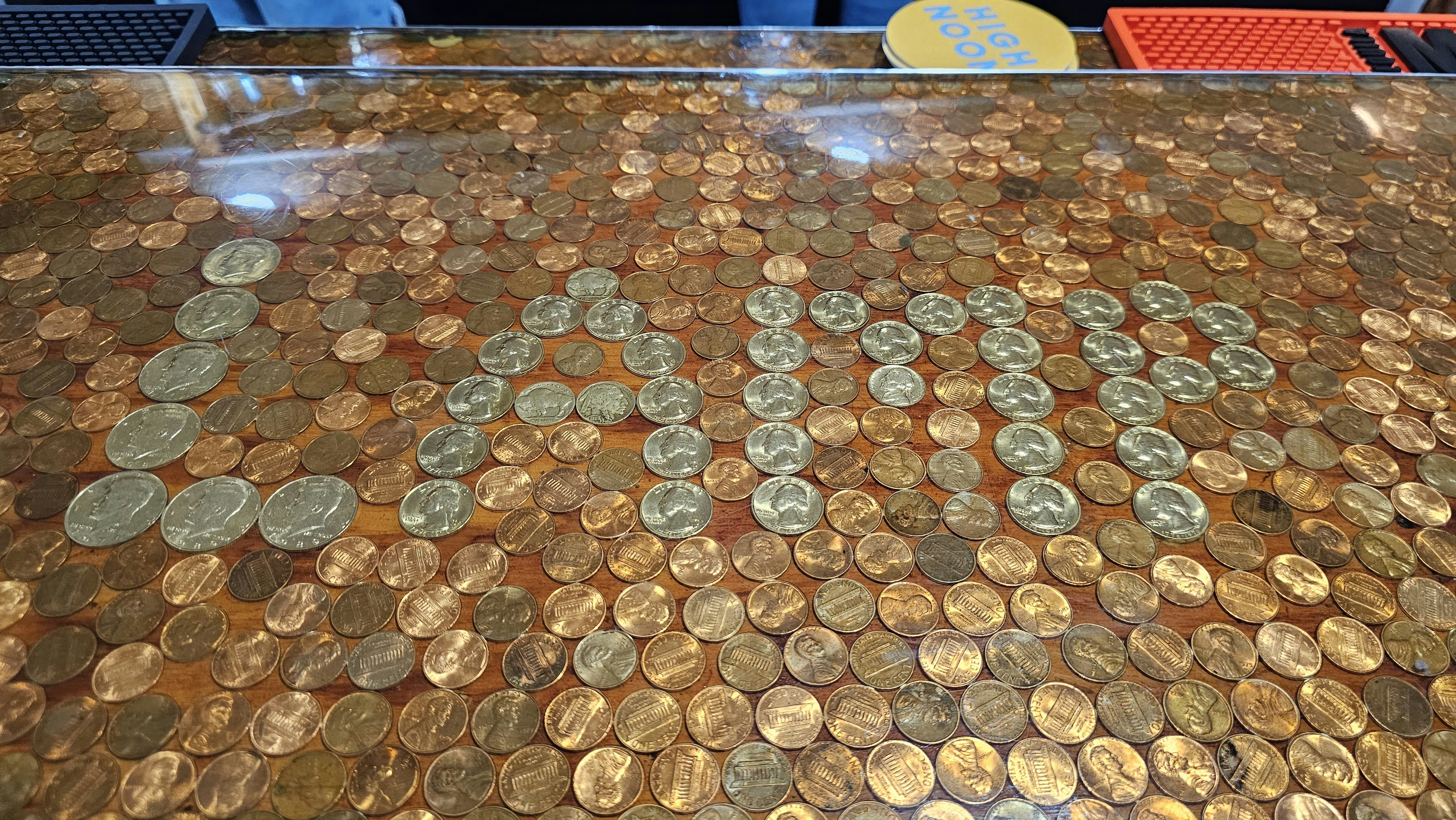 Coins in various denominations were used to spell out the word "Lamp" in the Lamp Lounge on the south side of Cheyenne.