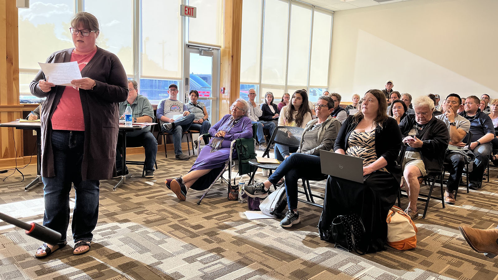 Sarah Reilley reads her own survey results to the Fremont County School District board Tuesday in defense of "Let's Talk About It," a controversial book in the Lander Valley High School library.