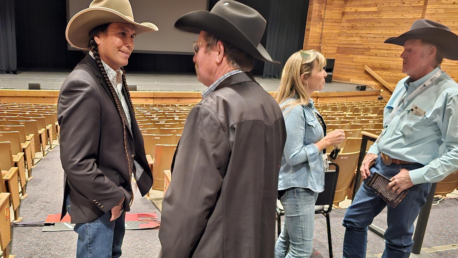 "Yellowstone" actor Moses Brings Plenty, who plays Mo Brings Plenty on the hit television series, talks to attendees after a Lane Frost documentary. Brings Plenty drove all night to get to the event on time.