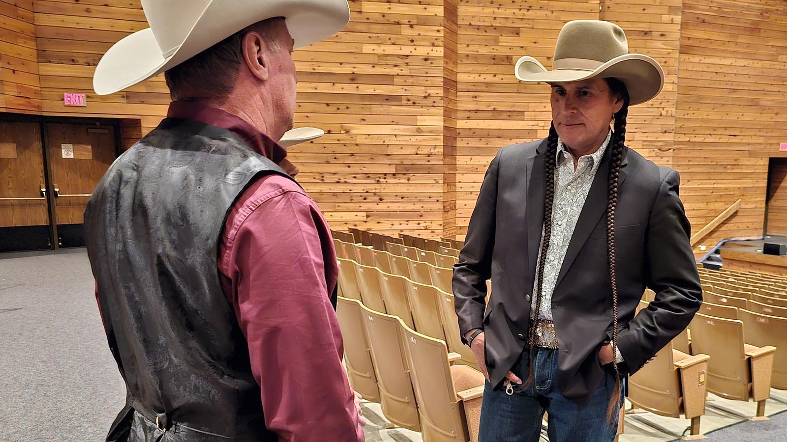 "Yellowstone" actor Moses Brings Plenty, who plays Mo Brings Plenty on the hit television series, talks to attendees after a Lane Frost documentary. Brings Plenty drove all night to get to the event on time.