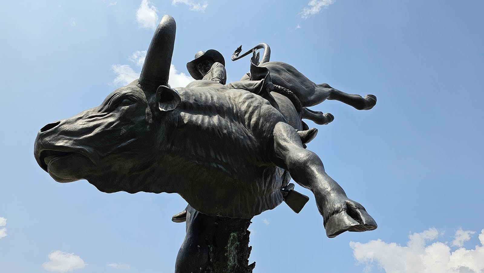 A statue of Lane Frost eternally riding a bull is on display outside the Cheyenne Frontier Days Old West Museum.