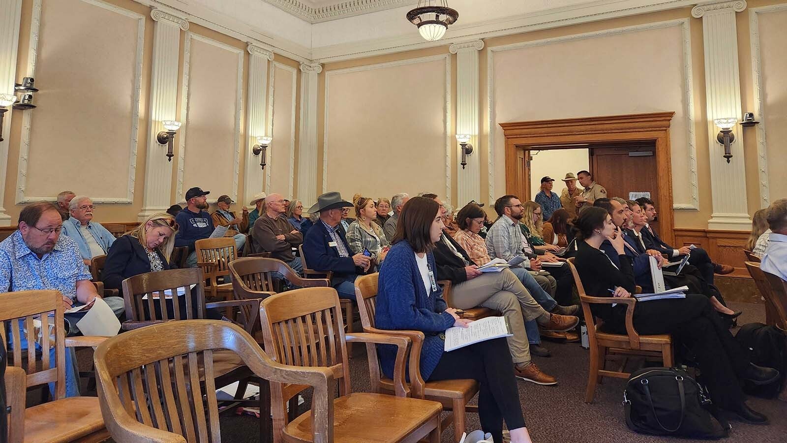 About 50 people wait to speak about the proposed Laramie Range Wind Project during Tuesday's Laramie County Commission meeting.