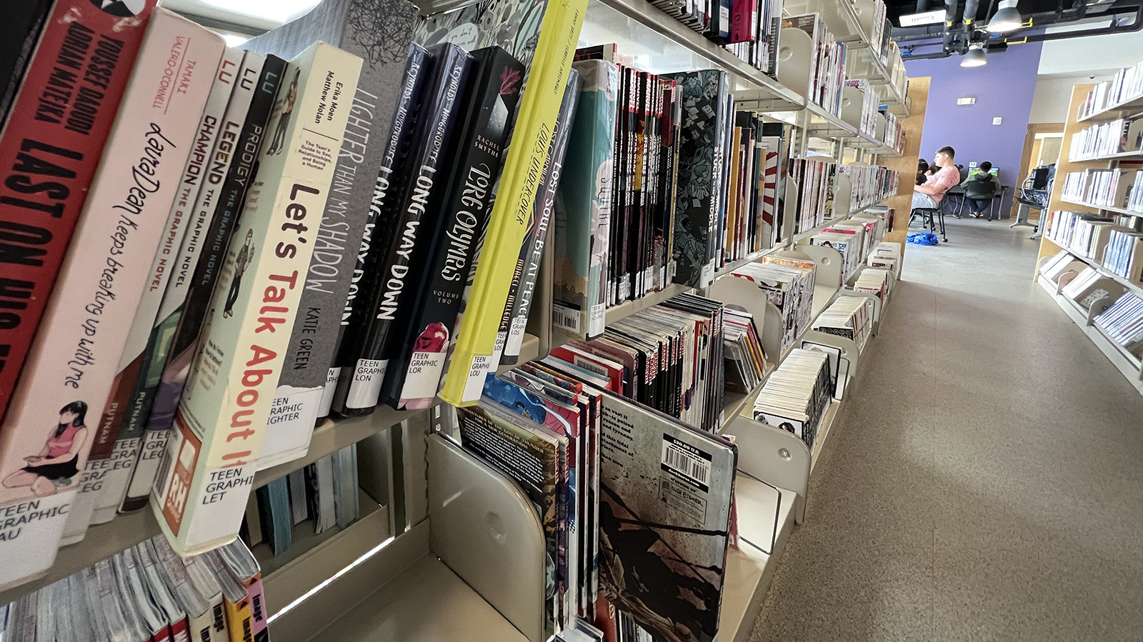 "Let's Talk About It" by Erika Moon and Matthew Nolan, seen here on a shelf in the teen section of the Laramie County Public Library's main branch at 22nd Street and Pioneer Avenue in Cheyenne, has been challenged in libraries across the nation, including in Wyoming.
