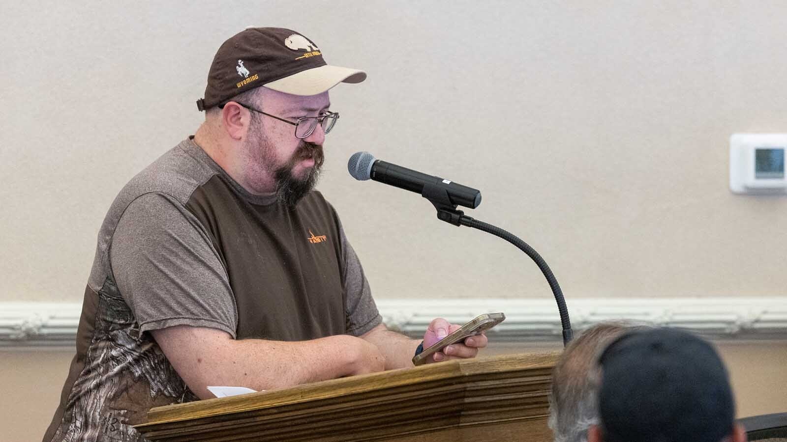 Laramie County locals clashed Thursday over a proposed 56,000-acre wind project that would cover an area nearly three times the size of Cheyenne. Some were ranchers advocating for property rights, others for impacts on wildlife like eagles and earthworms. Here, resident Ryan Snyder speaks during the meeting.