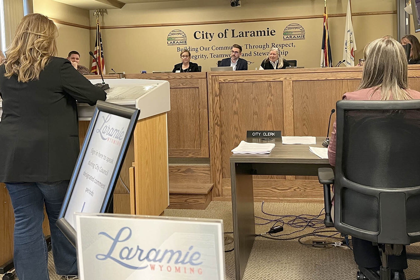 More than 30 people testified against a proposed apartment building in downtown Laramie before the city council late Tuesday. The council voted to kill the project.
