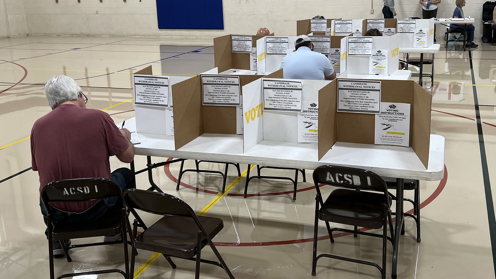 Laramie voters fill out their ballots during the 2022 Wyoming primary.