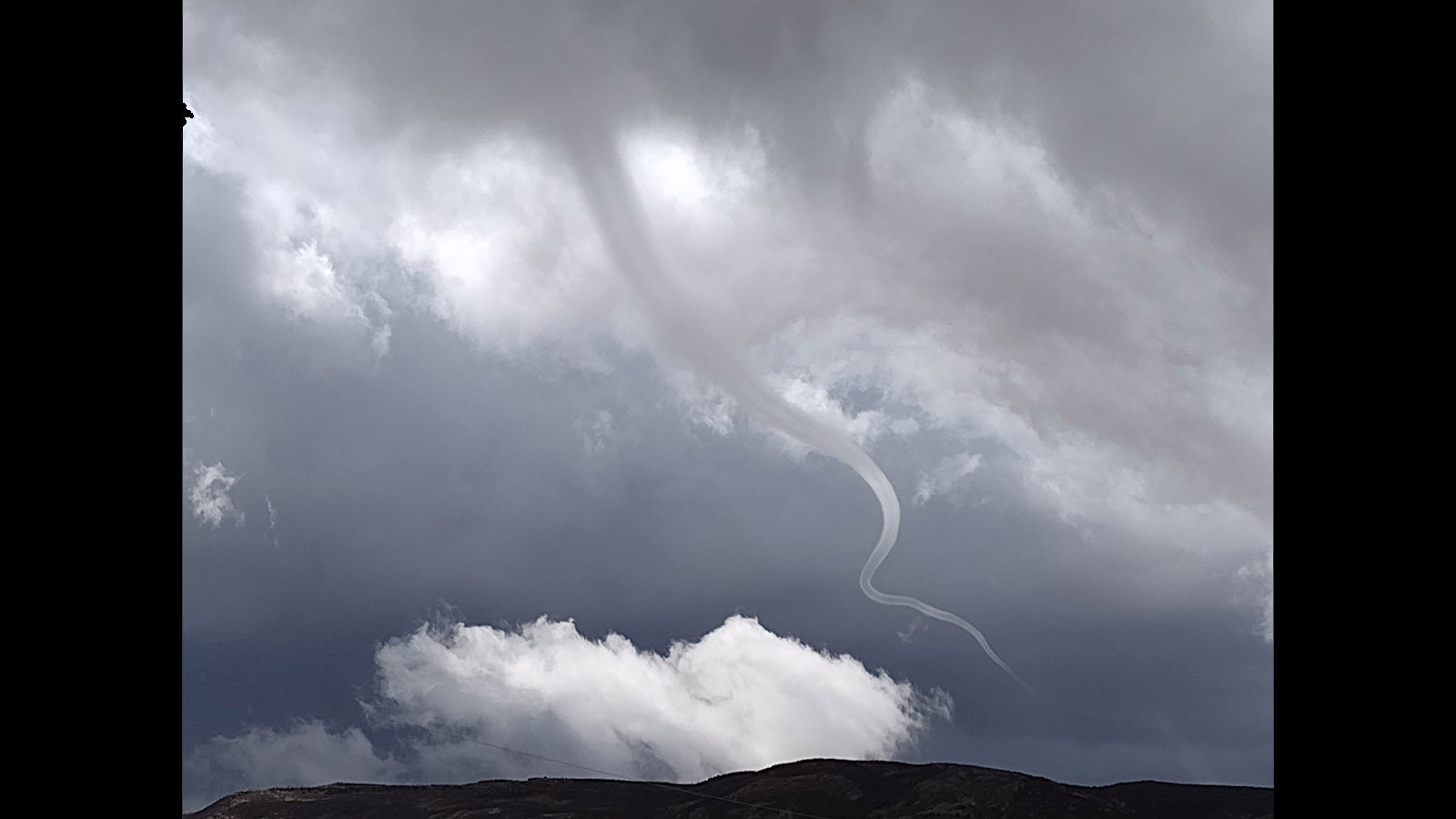 Albany County resident David De Pastina captured this photo of a funnel cloud that nearly touched down near his home about 7 miles northeast of Laramie at about 11:30 a.m. Thursday.